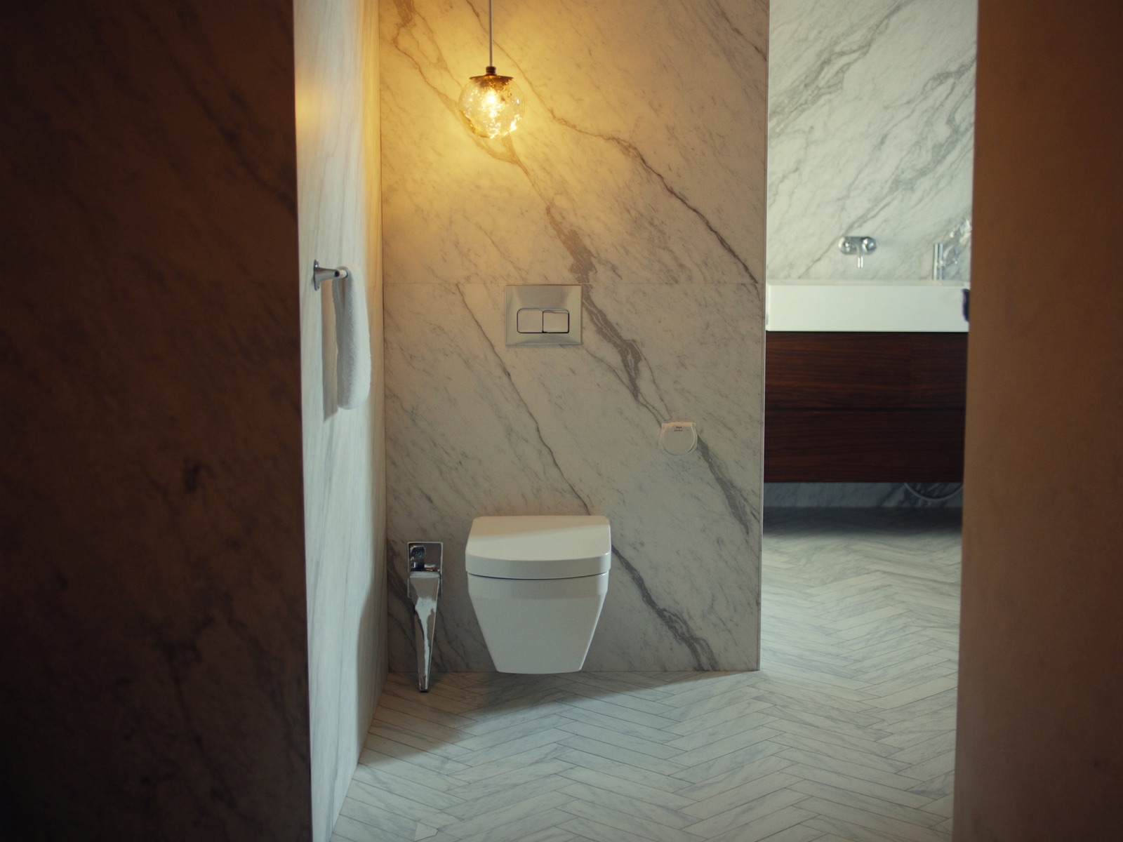 Luxury marble bathroom with wall-hung toilet and walnut vanity