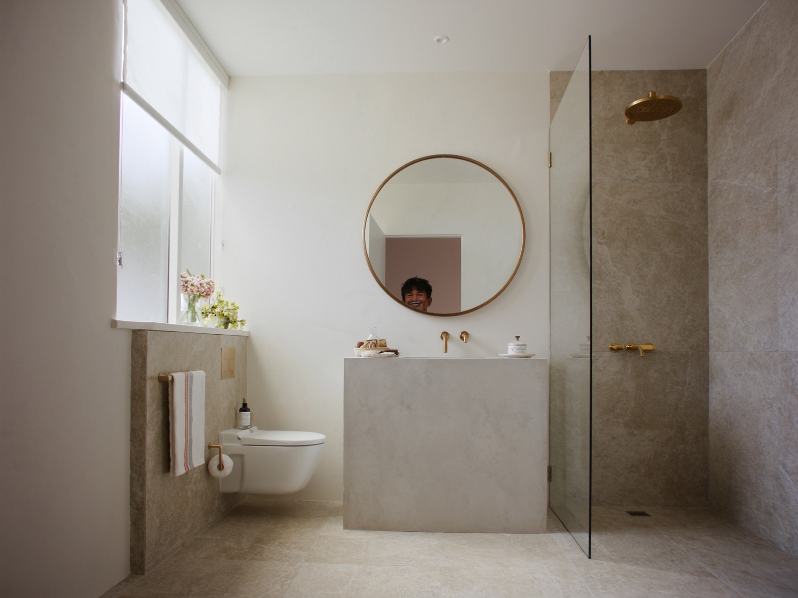 The bathroom finish standard Terry works to - modern fixtures, clean tiling